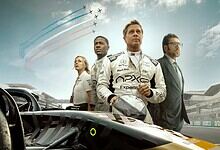 F1: The Movie screening at Hyderabad cinemas, featuring race car drivers and aerial stunt planes in the s.