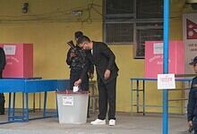 A man votes in Nepal's elections