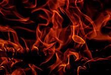 Flames and smoke engulf a residential building during a fire in Hyderabad's Begumpet.