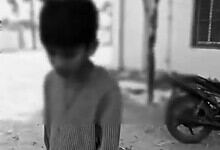 Student being disciplined by a principal in Telangana despite corporal punishment ban.