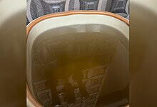 Yellowish drinking water in a household container in Manikonda.