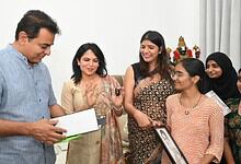 KTR distributes laptops to young girls under Touch A Life Foundation