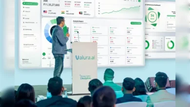 Valura.ai presentation showing AI-driven investment dashboard to audience.