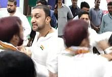 The image shows moments before Congress Karwan constituency in-charge Osman Al Hajri pushing Congress Nampally constituency in-charge Feroz Khan to the ground, and also Hajri charging at senior Congress leader V Hanumantha Rao on Wednesday, May 27, 2026.