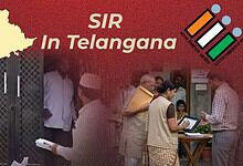 People waiting outside a government office in Telangana, India, with officials assisting and using digita.