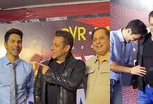 Group of men celebrating on stage at The Siasat Daily event, smiling and enjoying the moment.