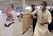 Former Pakistan cricket captain Wasim Akram performs the Rami al-Jamarat ritual in Mina during Haj, using a bowling-style motion while throwing pebbles.