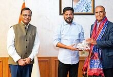 Revanth Reddy with Airtel chief and another official during a meeting in Telangana.