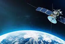 Satellite orbiting Earth with solar panels and space background.