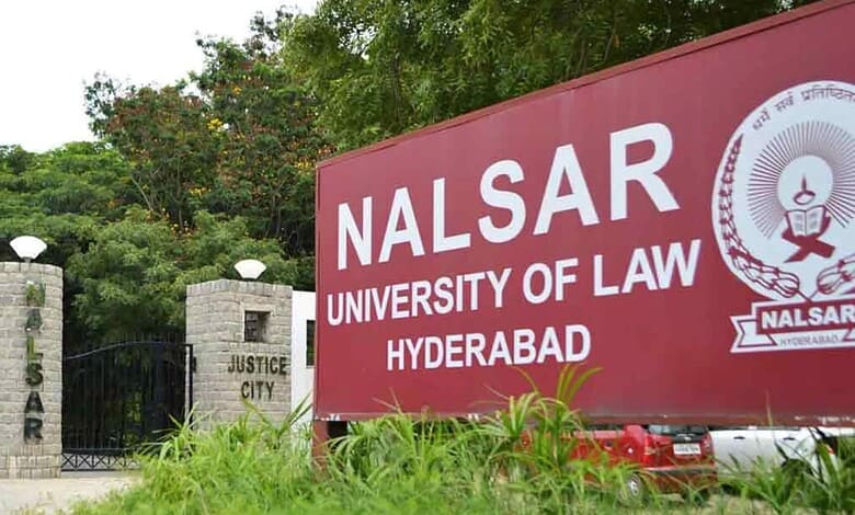 NALSAR University of Law Hyderabad entrance with greenery and justice city sign.