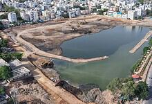 HYDRAA protects public utility land in Chengicherla and removes encroachments from Ramanthapur Pedda Cheruvu on Tuesday, July 14, 2026.