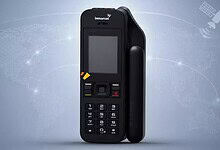 Inmarsat satellite phone with a black rugged design and large screen for satellite communication.