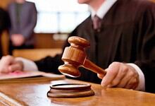 Judge's gavel in court, symbolising legal proceedings and justice.