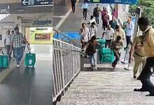 People at Hyderabad metro station with luggage and bags, busy transit scene.