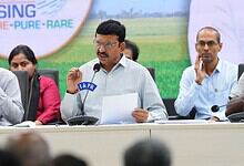 Telangana minister speaking at a press conference about registration clearance progress.