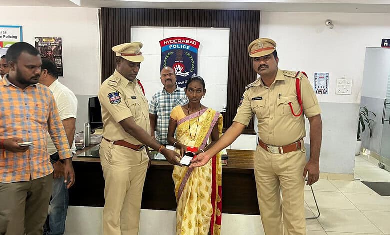 Mailardevpally police return a lost mobile phone to a woman