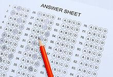 OMR sheet with a red pencil