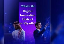 Two men discussing digital innovation in Riyadh Digital District.