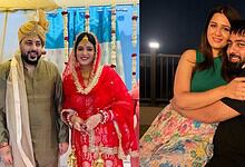 Happy couple celebrating a traditional Indian wedding with vibrant attire and joyful expressions.