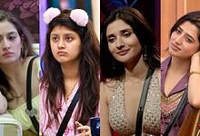 Four women with different expressions, sitting indoors, in a casual setting.