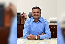 New Chairman of Telangana Pollution Control Board seated at desk in office.