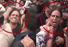 Women MLAs appear distressed amid a chaotic scene at the Assembly.