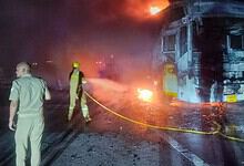 Noida: Firefighters at the site after a sleeper bus caught fire on the Yamuna Expressway in the Greater Noida area, killing nine passengers, in Noida, early Thursday, Sept. 24, 2026. (PTI Photo)