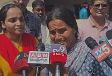 A woman cries afte being duped in the chit fund scam