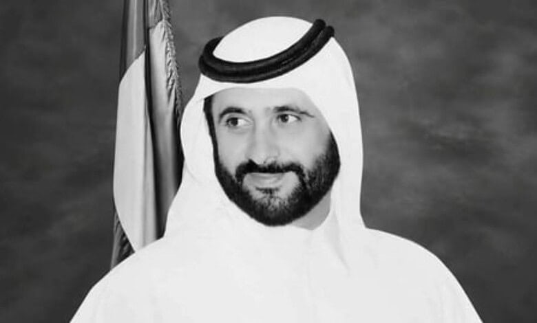 Black and white portrait of Sheikh Ahmed Al Maktoum in traditional attire.