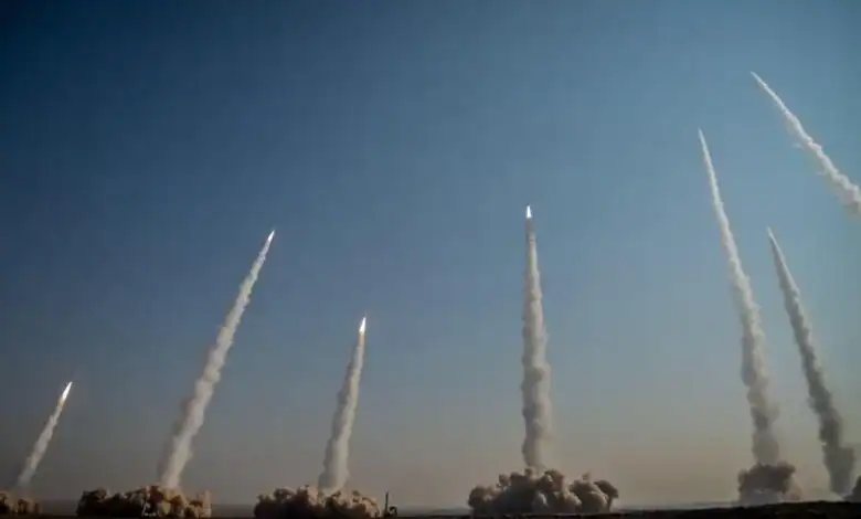 Iranian ballistic missiles launched into the sky during an earlier attack.