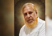 Portrait of Mahtab Qadr, renowned Urdu journalist and poet, with a serious expression and white attire.