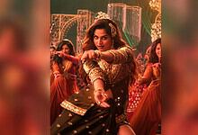 Ayesha Khan dancing on stage during her live 'Shararat' performance in Hyderabad.