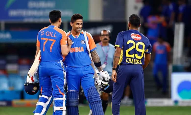 Indian cricket players celebrate during a match at the stadium.