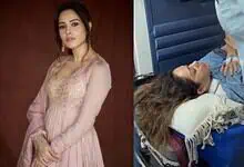 Nushrratt Bharuccha lying on hospital stretcher after Bali accident, receiving medical attention.