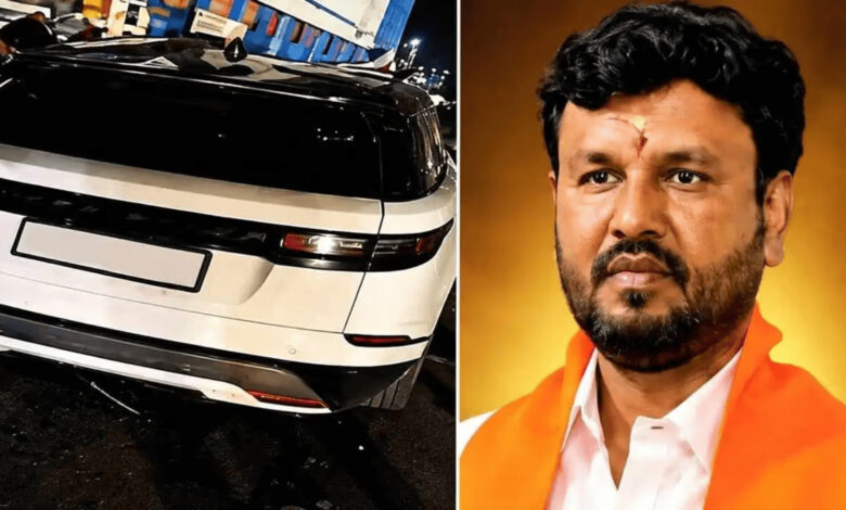 BJP leader with a serious expression, wearing an orange scarf, in a close-up portrait.