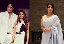 Tanishaa Mukerji in a white saree at a formal event, posing confidently.