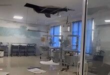 Ceiling collapse at Bhupalpally government hospital causing damage to medical equipment.
