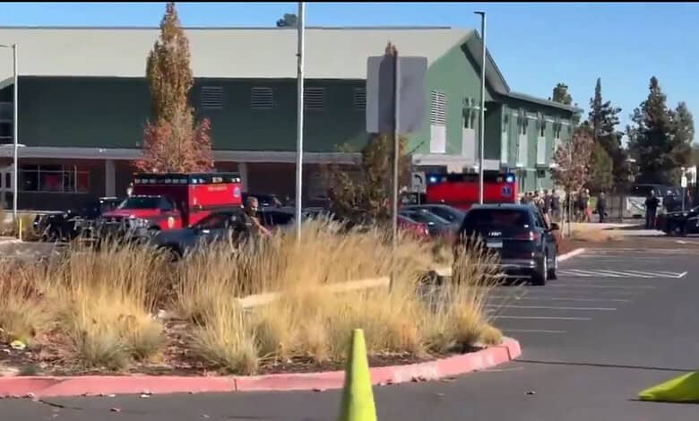 Police officers cordon off school in Oregon after shooting incident