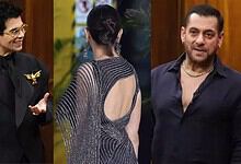Three Bollywood celebrities during a talk show, engaging in conversation.