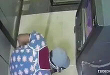 Men in nighties using gas cutter to loot ATM in Kamareddy at night.
